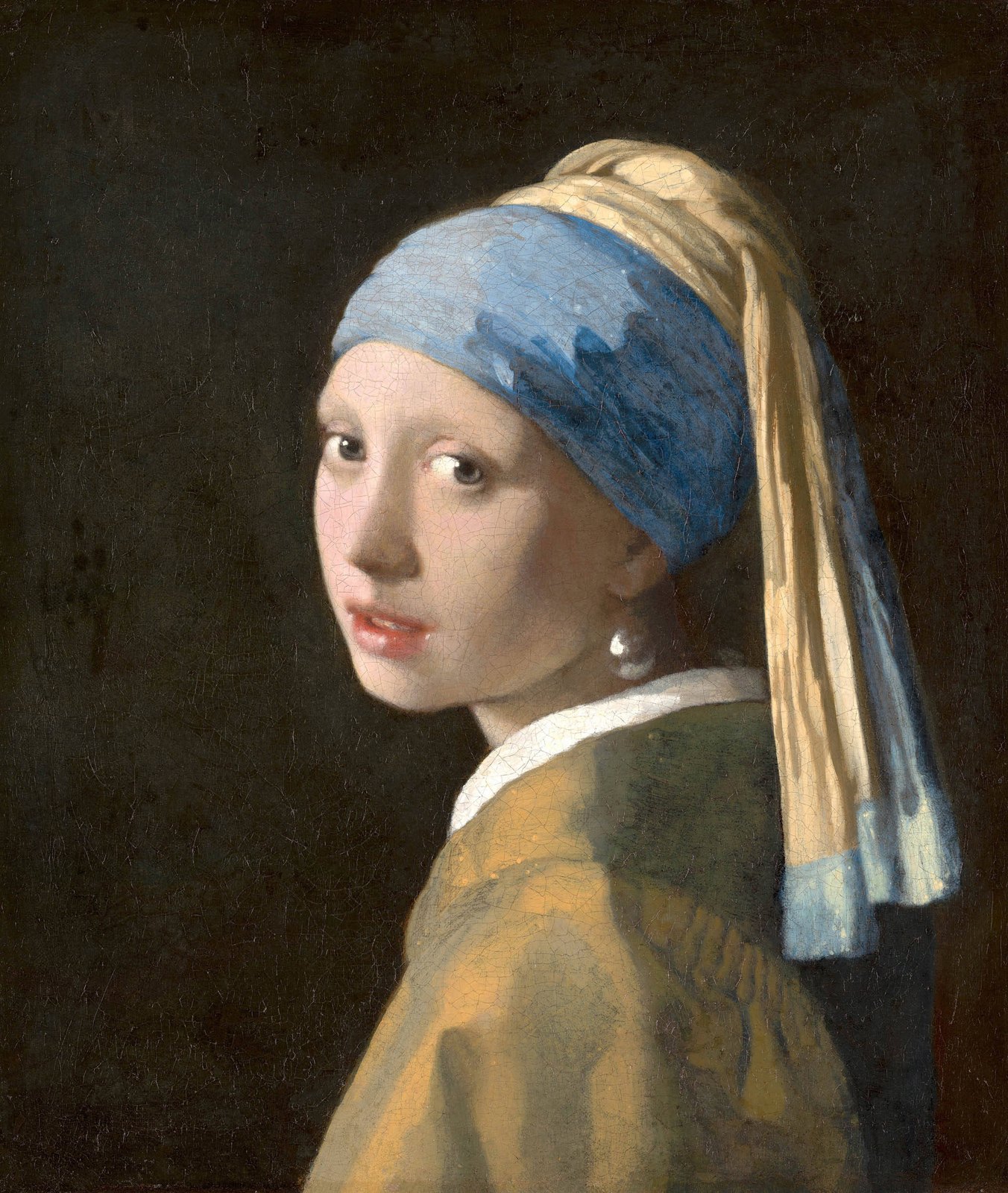 Johannes Vermeer, Meisje met de parel: een meisje met een blauw-gele tulband en een parel kijkt over haar schouder naar de toeschouwer